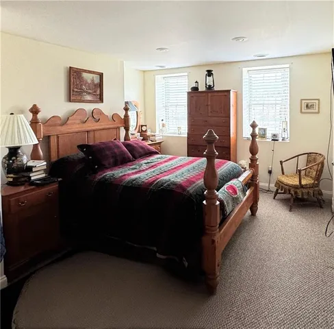 a bathroom with a tub toilet and sink