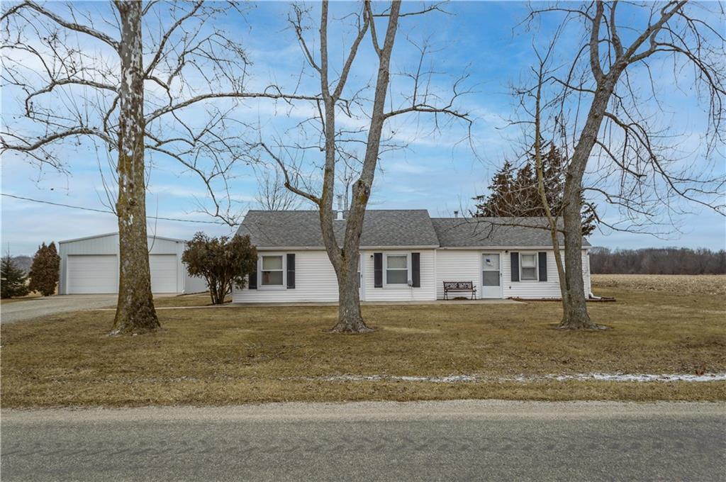 5581 North County Road Lerna, IL 62440 - Photo 1 of 1 a house that has a tree in front of it