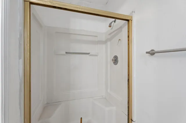 a view of an empty walk in closet