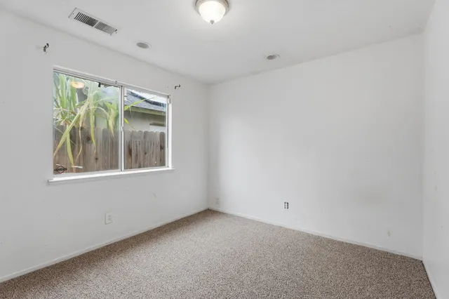 a view of cabinets and utility room