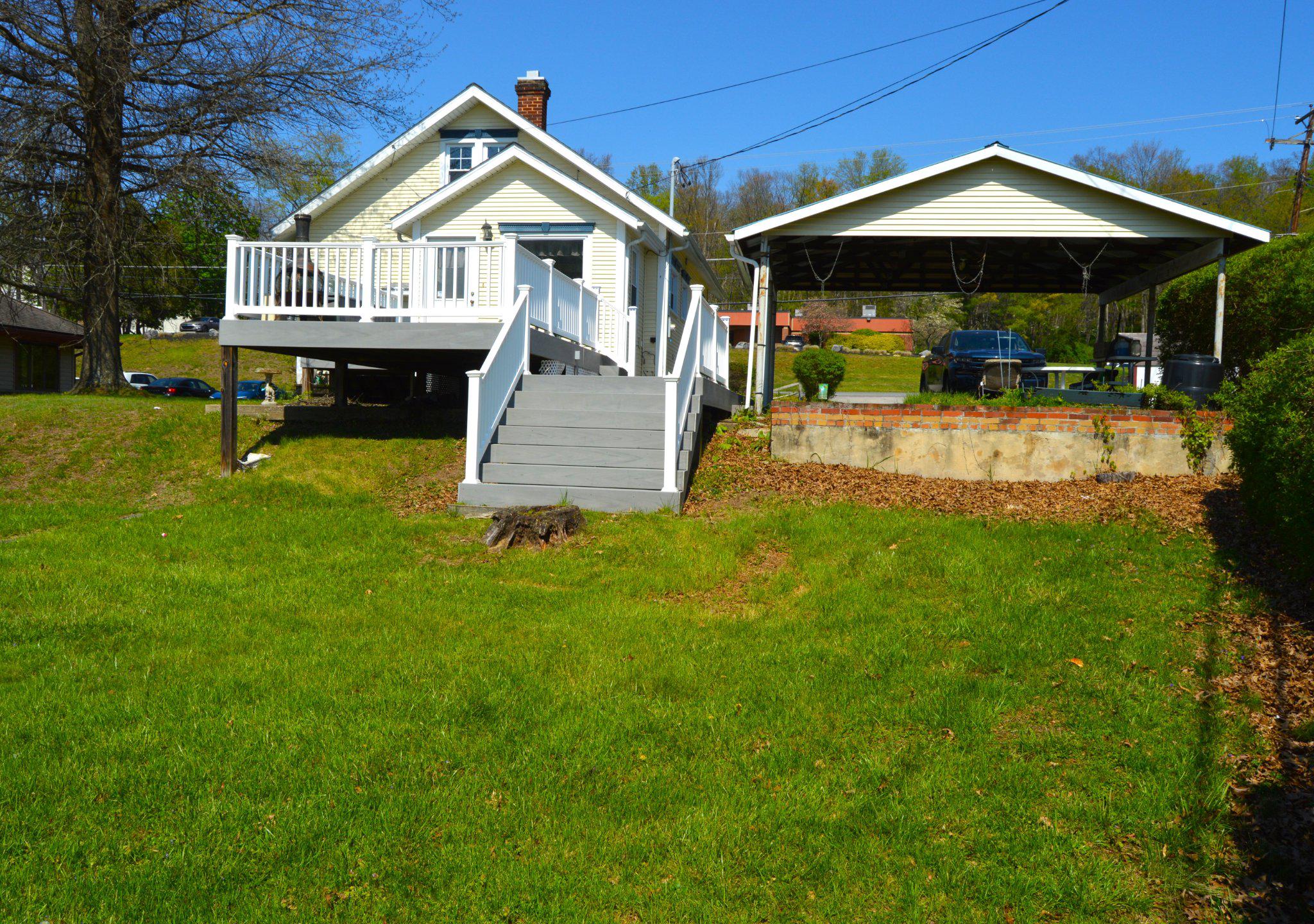 3225 Cold Springs Road Huntingdon, PA 16652 - Photo 39 of 40 a view of a house with backyard and sitting area