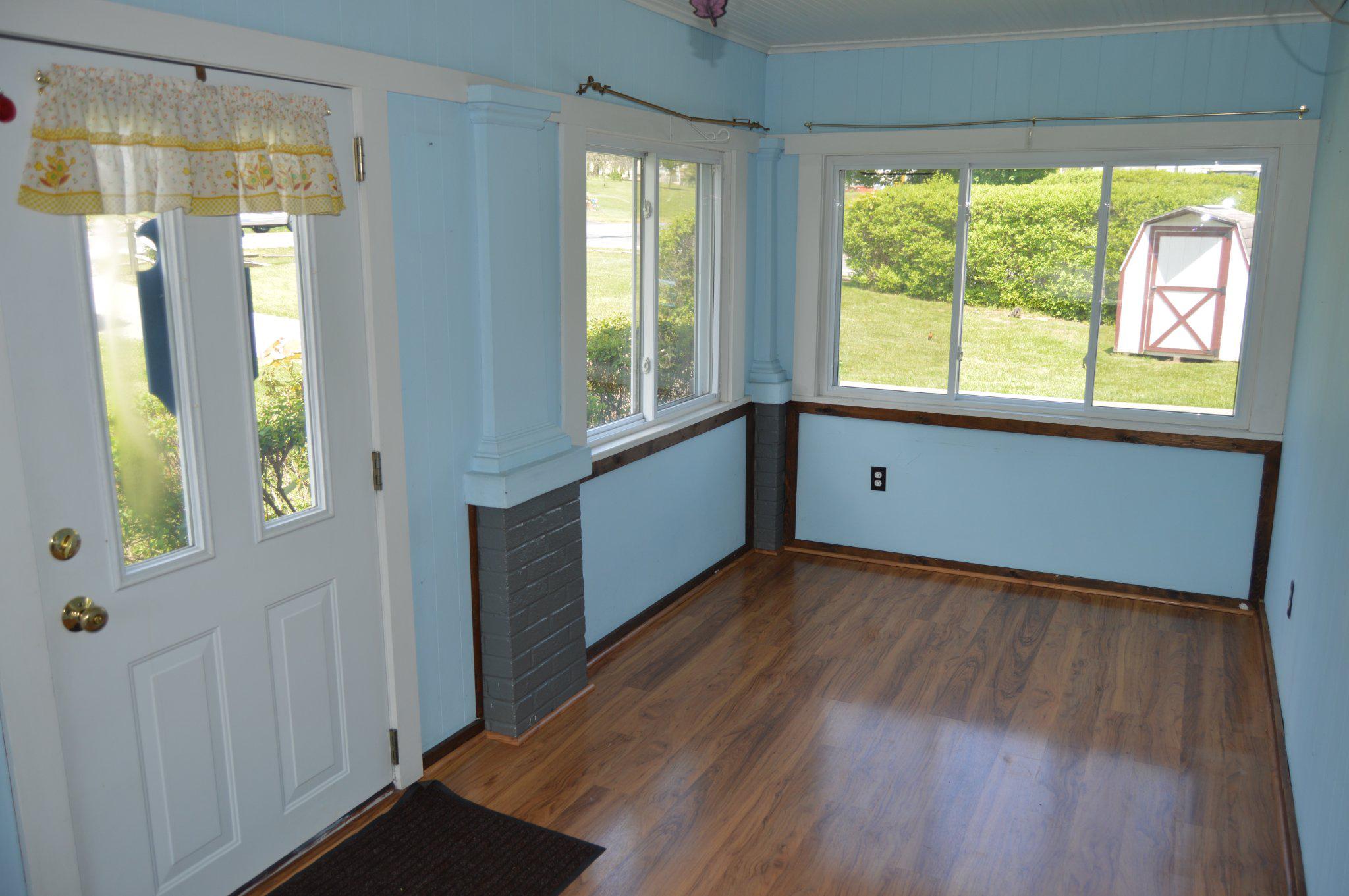 3225 Cold Springs Road Huntingdon, PA 16652 - Photo 8 of 40 a view of an empty room with wooden floor and a window
