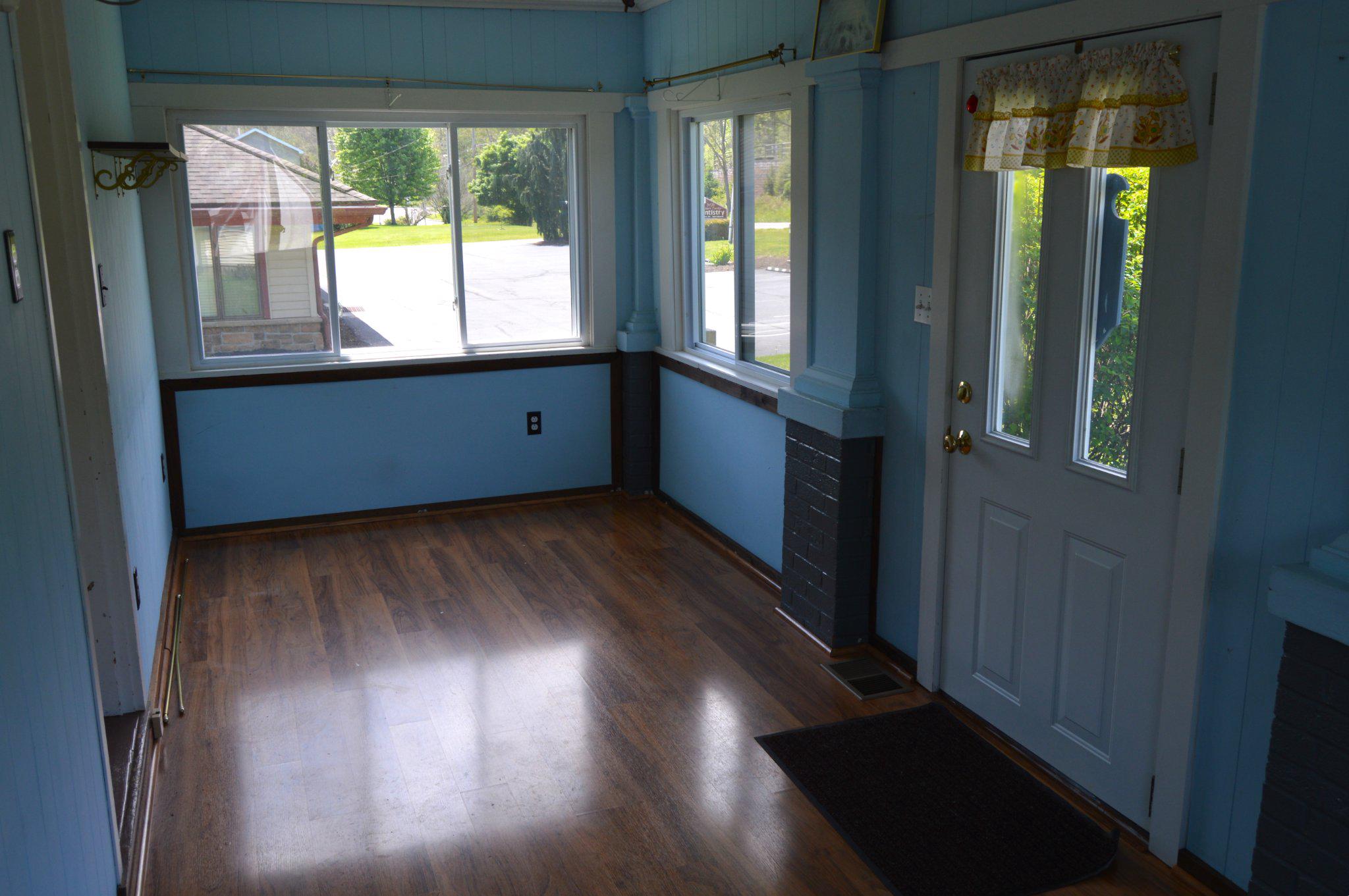 3225 Cold Springs Road Huntingdon, PA 16652 - Photo 9 of 40 an empty room with wooden floor and windows