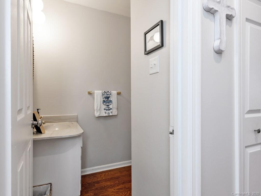 3516 Colony Road, Unit A Charlotte, NC 28211 - Photo 12 of 29 a bathroom with a sink and vanity