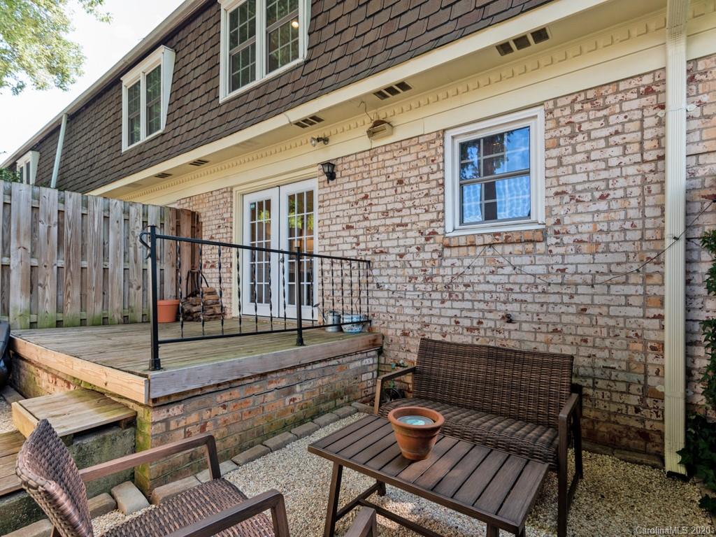 3516 Colony Road, Unit A Charlotte, NC 28211 - Photo 20 of 29 a view of house with wooden deck and furniture