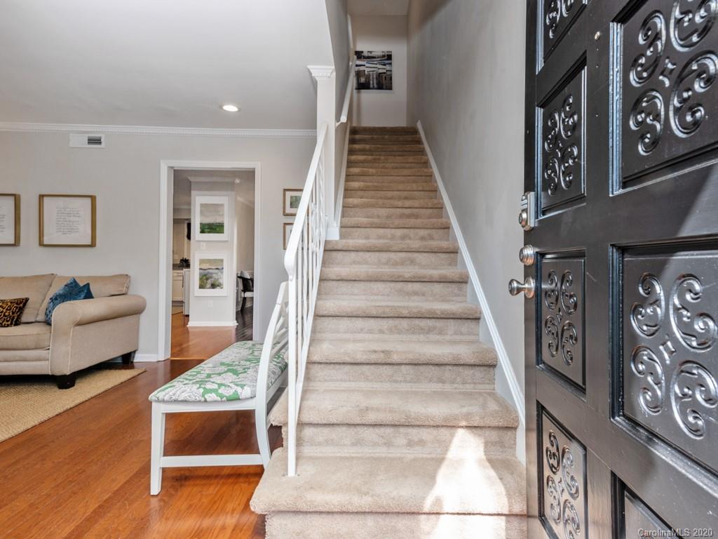 3516 Colony Road, Unit A Charlotte, NC 28211 - Photo 3 of 29 a view of entryway and hall with wooden floor