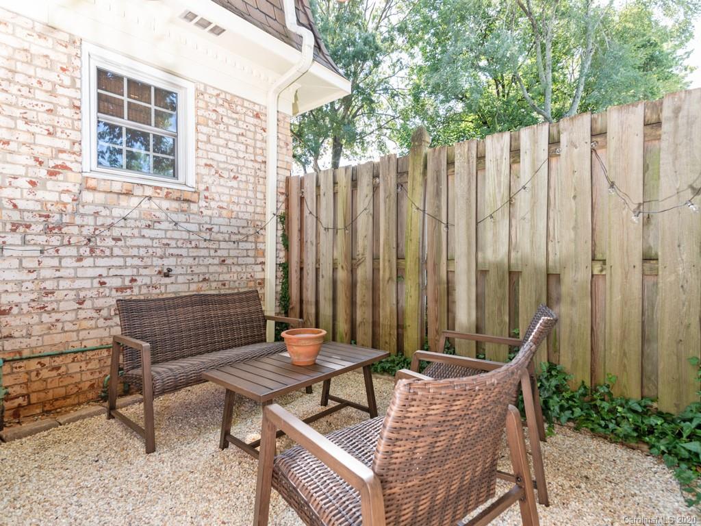 3516 Colony Road, Unit A Charlotte, NC 28211 - Photo 23 of 29 a outdoor sitting area with furniture and a window