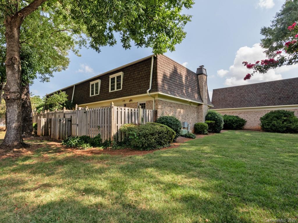 3516 Colony Road, Unit A Charlotte, NC 28211 - Photo 24 of 29 a front view of a house with garden