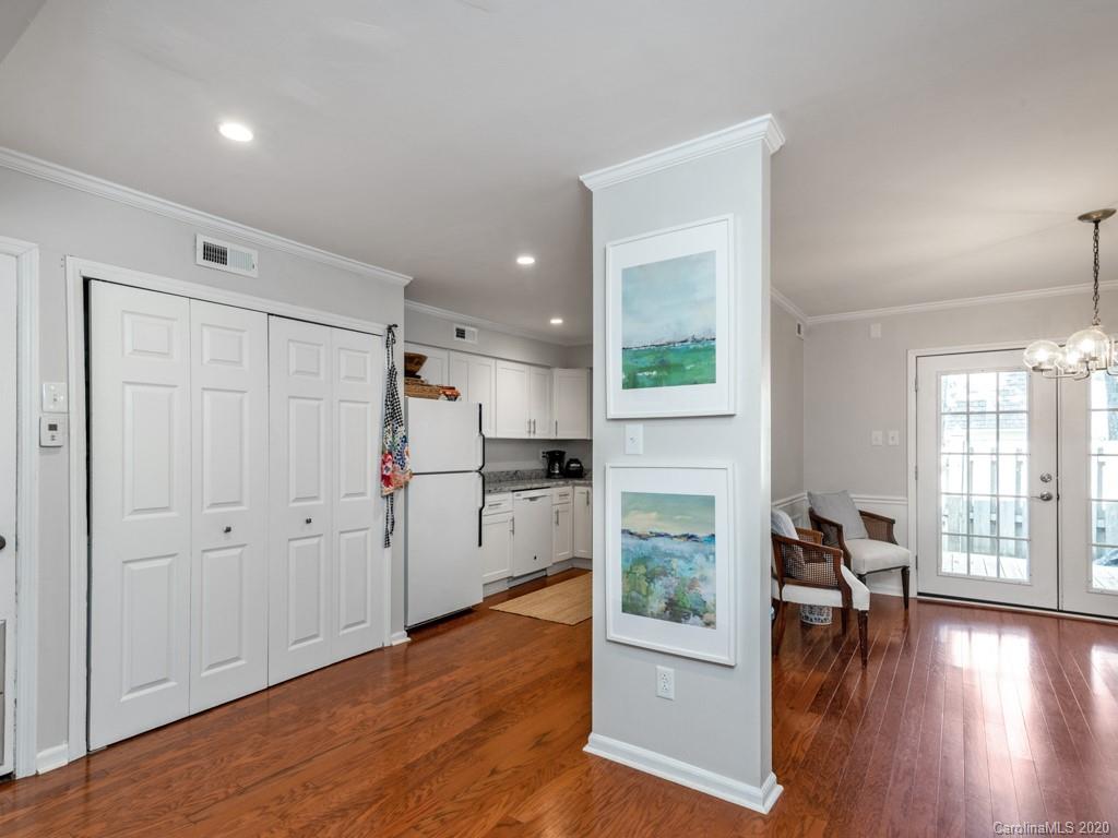 3516 Colony Road, Unit A Charlotte, NC 28211 - Photo 6 of 29 a view of open kitchen with wooden floor and electronic appliances