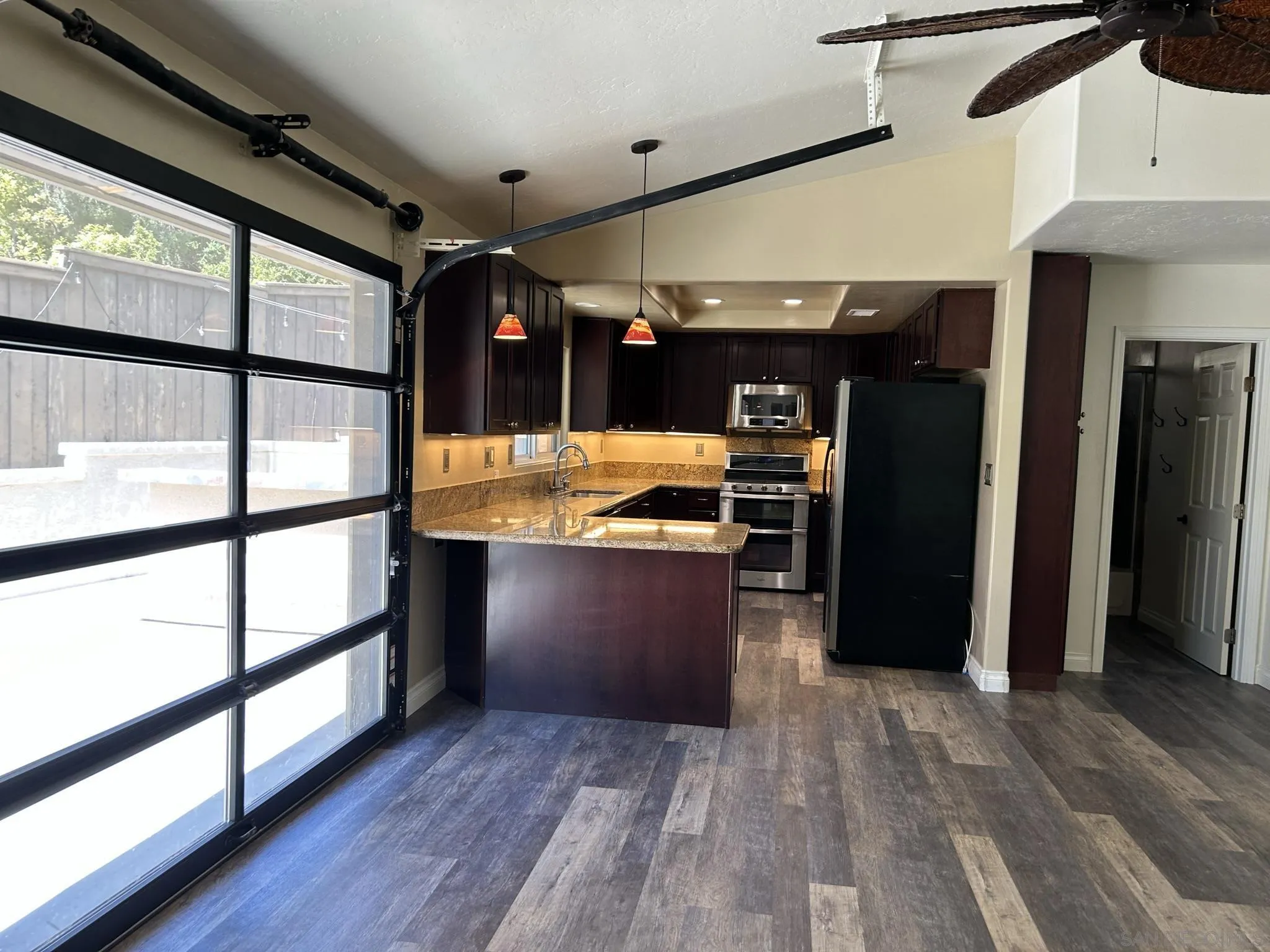 15408 Espola Road Poway, CA 92064 - Photo 12 of 27 a view of kitchen with refrigerator and window
