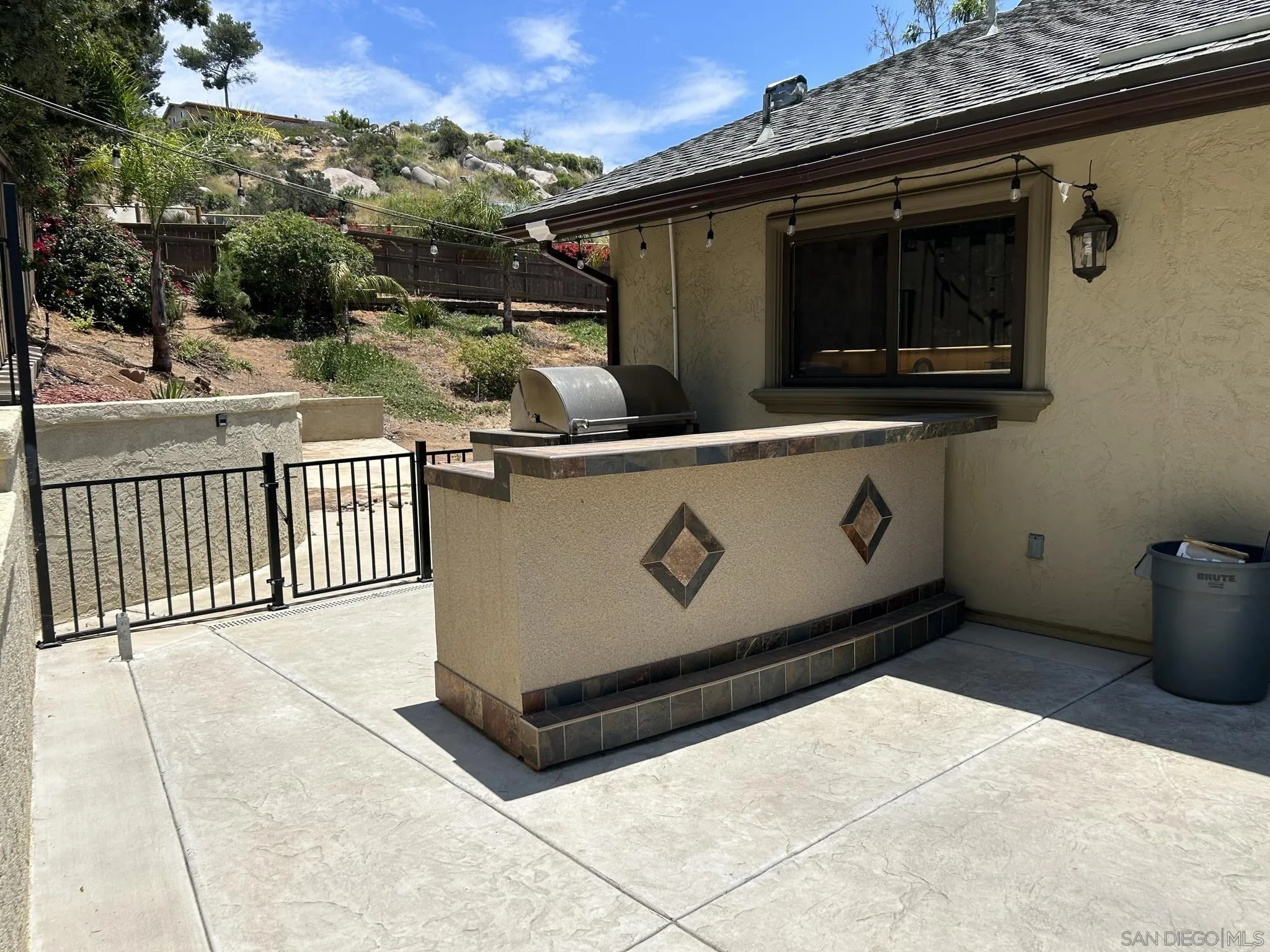 15408 Espola Road Poway, CA 92064 - Photo 5 of 27 a view of a back yard of the house