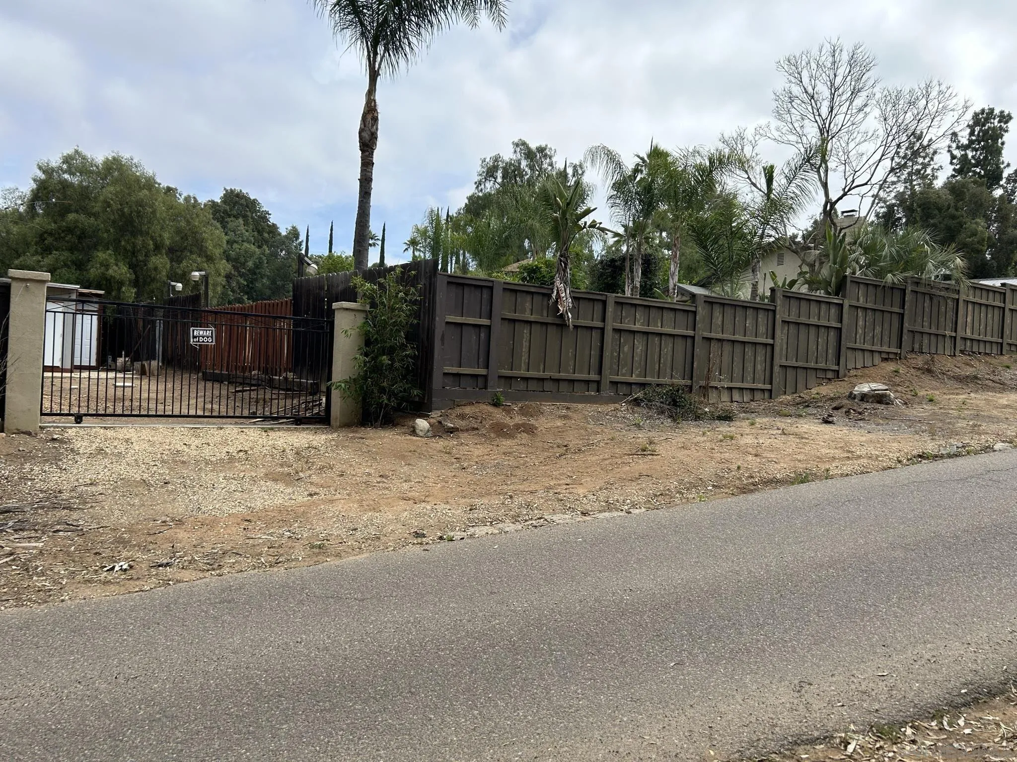 15408 Espola Road Poway, CA 92064 - Photo 8 of 27 a view of backyard space and fence