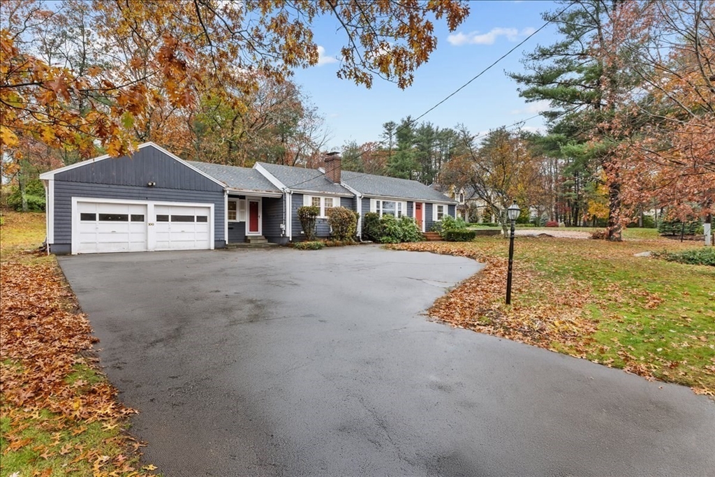 100 Whiting Street Hingham, MA 02043 - Photo 3 of 34 a front view of a house with a yard and trees
