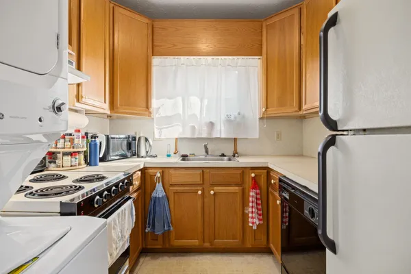 a view of storage and utility room with washer and dryer