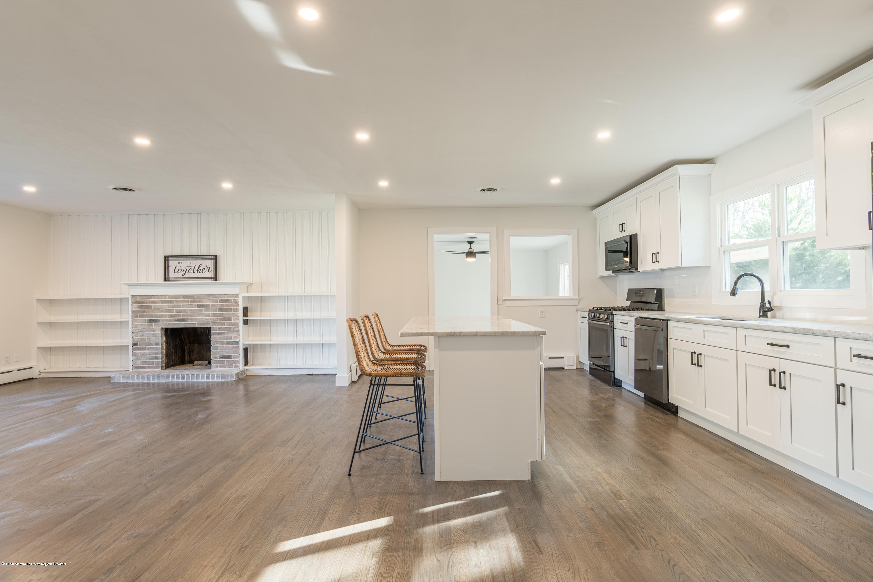 15 Johnson Road Lawrence Township, NJ 08648 - Photo 11 of 39 a kitchen with white cabinets and chairs