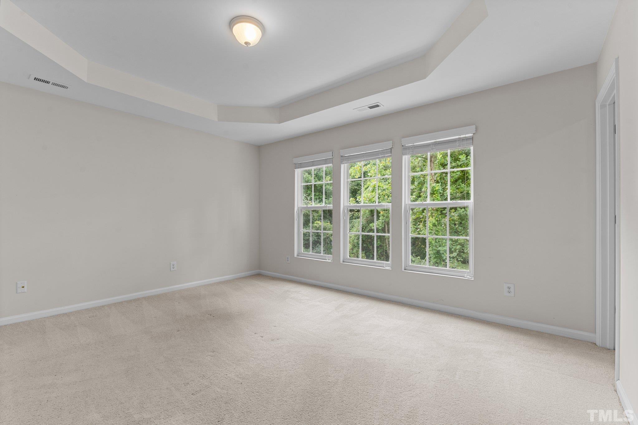 7154 Racine Way Raleigh, NC 27615 - Photo 15 of 31 an empty room with a window