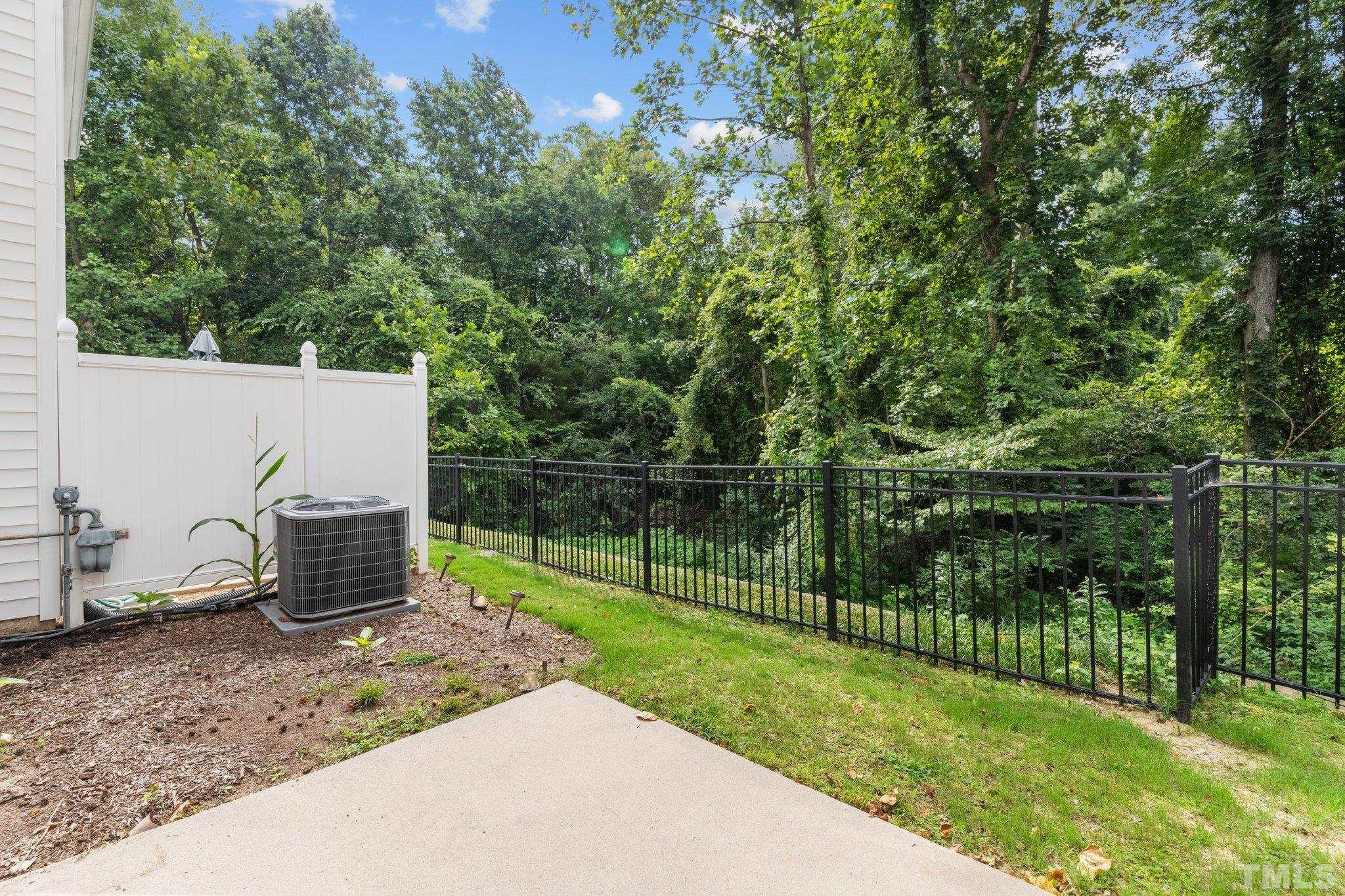 7154 Racine Way Raleigh, NC 27615 - Photo 27 of 31 a view of a deck with a backyard