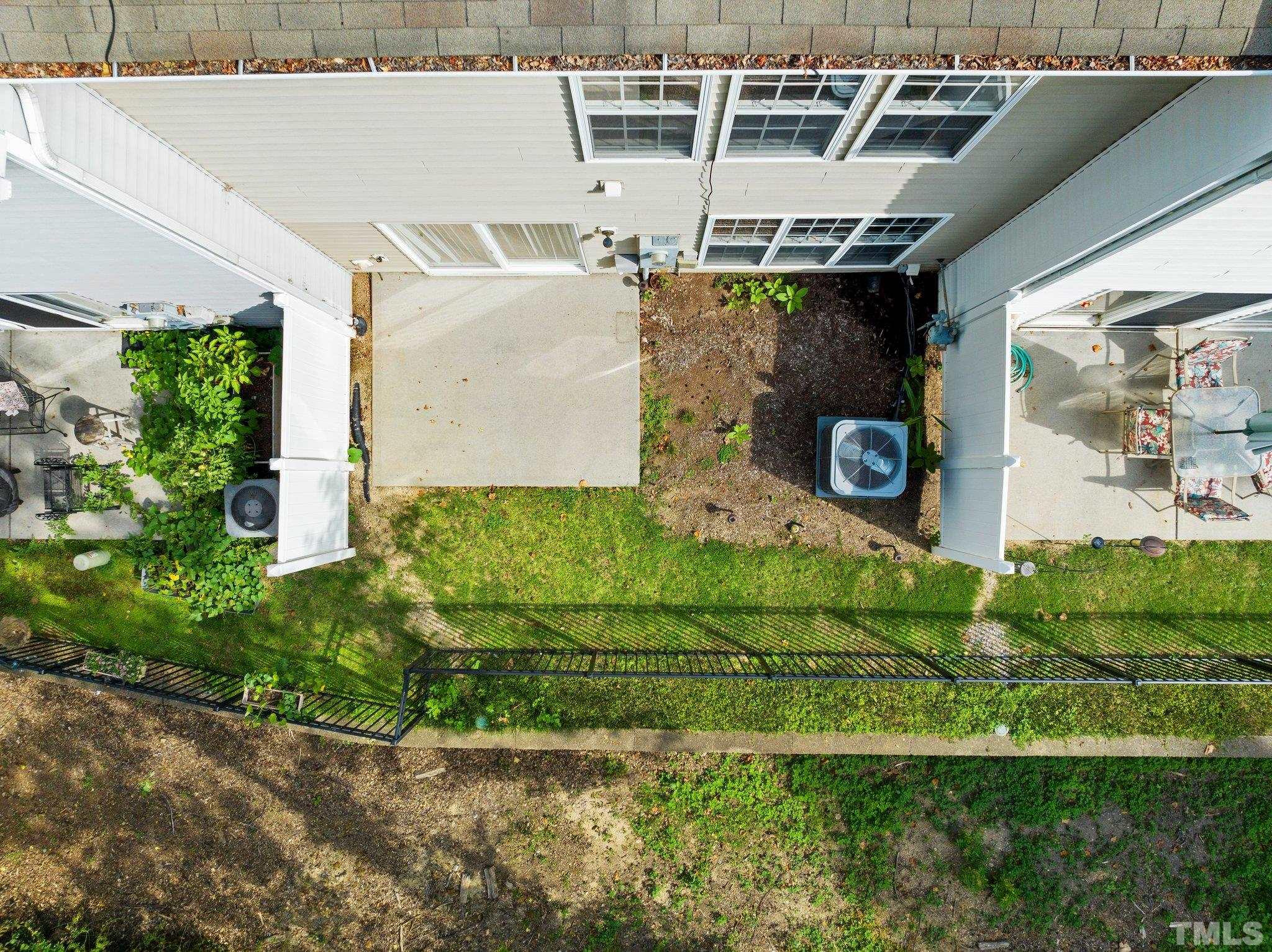 7154 Racine Way Raleigh, NC 27615 - Photo 28 of 31 an aerial view of a house with a yard