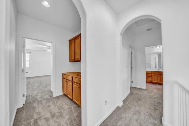 a view of a sink and washer dryer