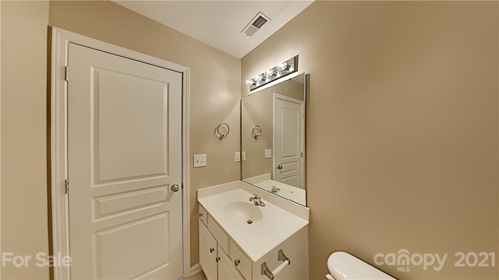 847 Gentlewinds Court Fort Mill, SC 29708 - Photo 12 of 13 a bathroom with a sink a toilet and shower