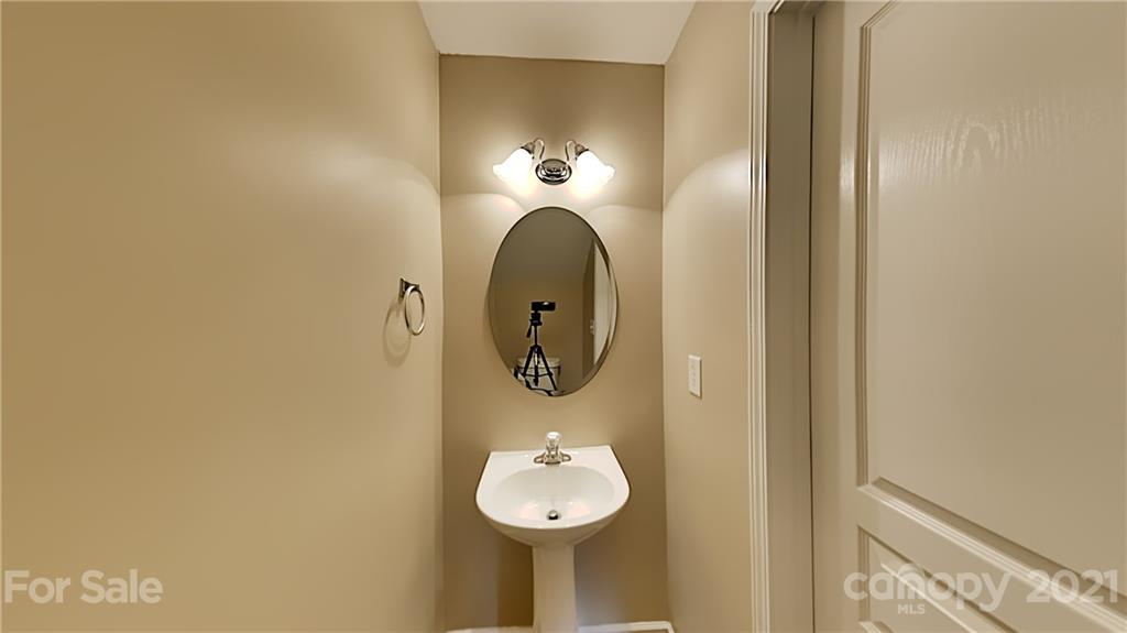 847 Gentlewinds Court Fort Mill, SC 29708 - Photo 7 of 13 a bathroom with a sink and a mirror