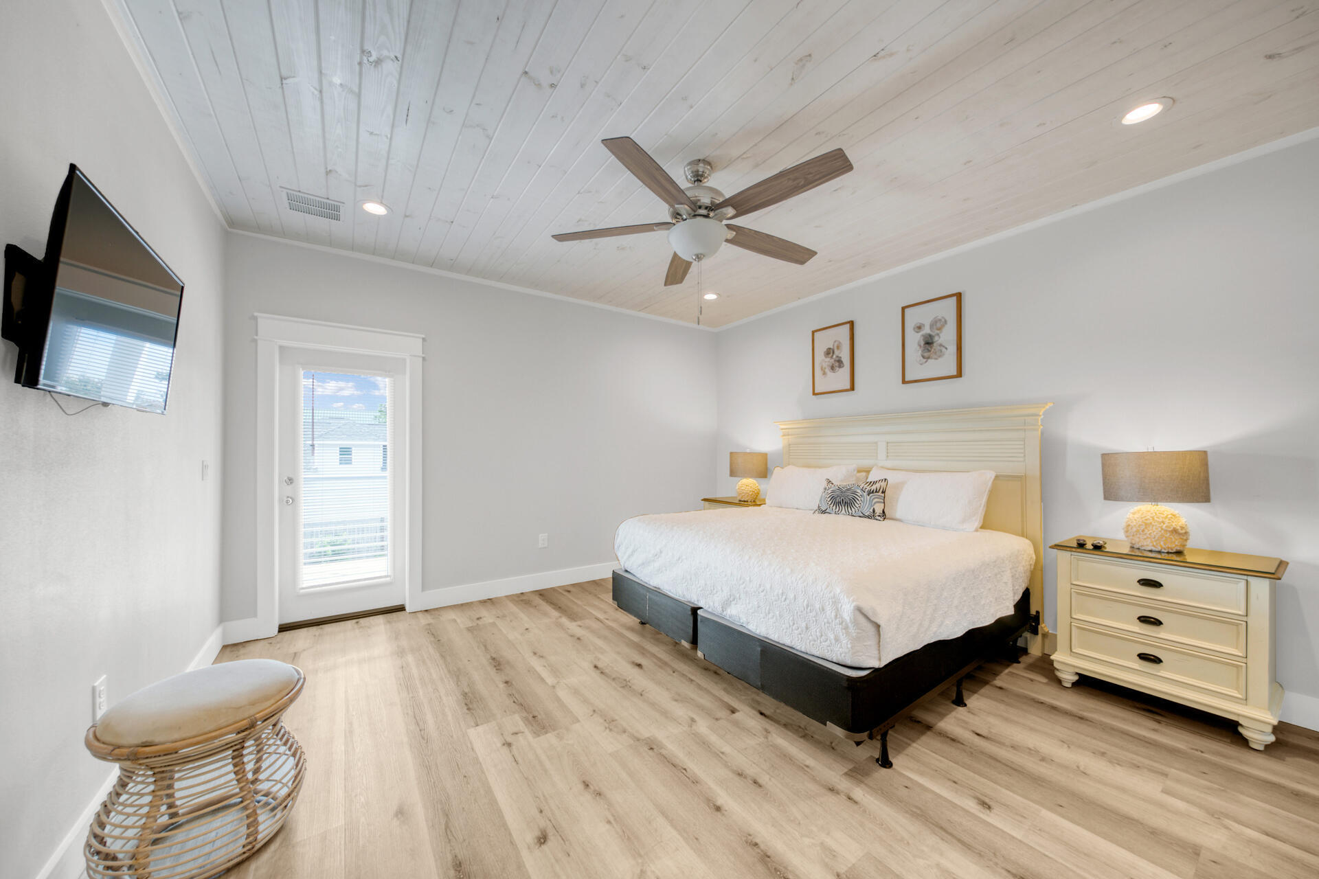 106 Shirah Street Destin, FL 32541 - Photo 11 of 67 a bedroom with a bed and a tv