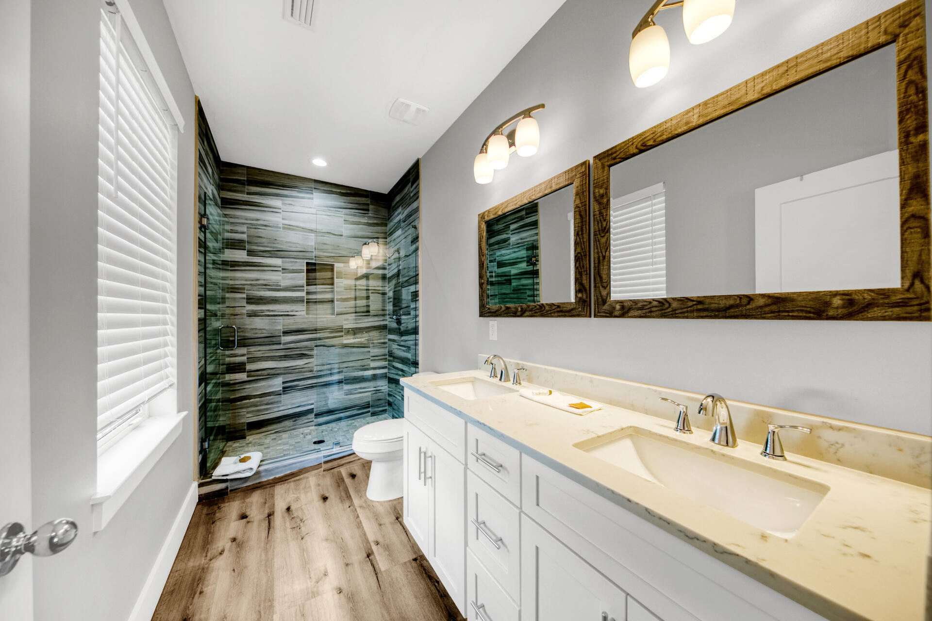 106 Shirah Street Destin, FL 32541 - Photo 12 of 67 a bathroom with a sink mirror and a bathtub