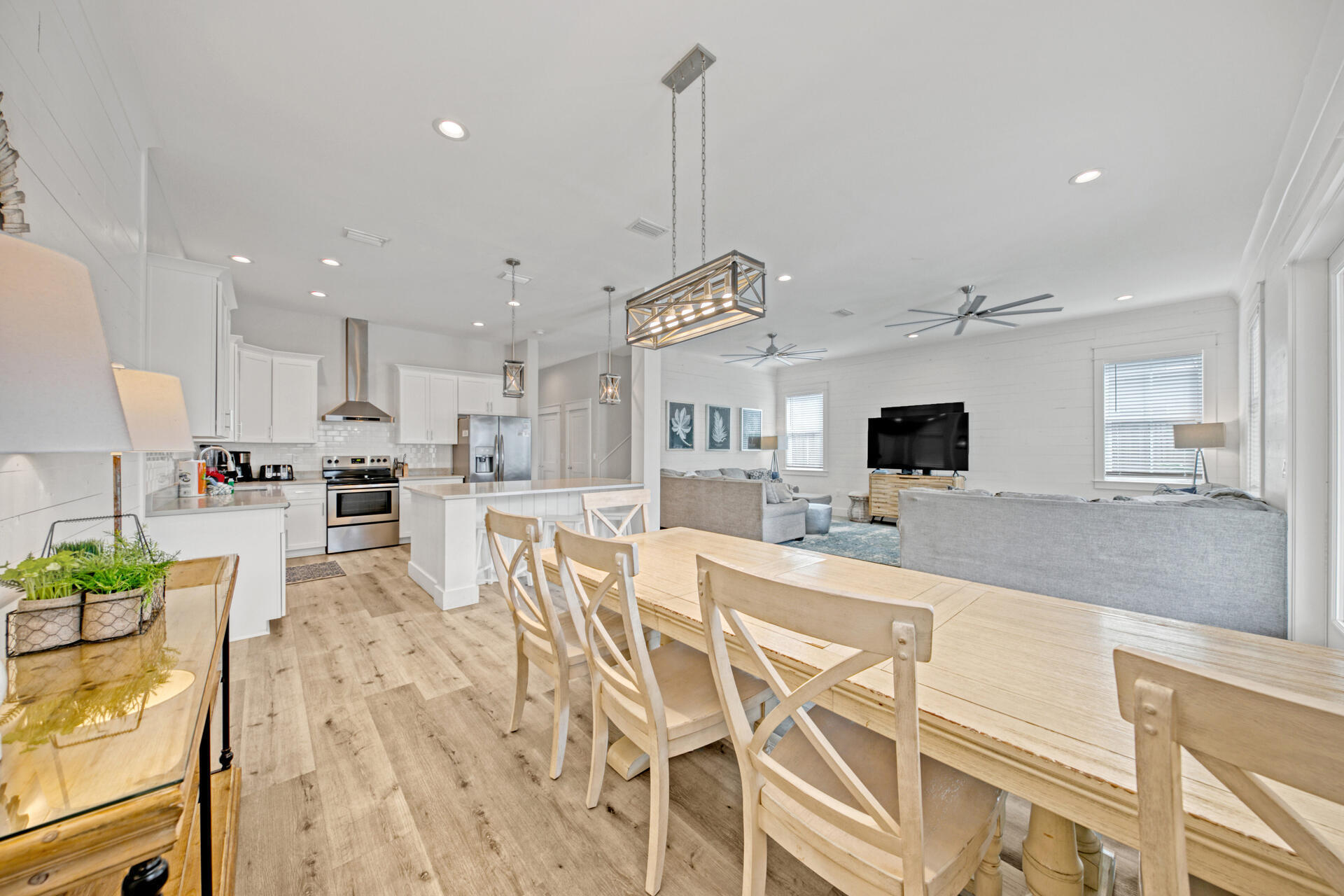106 Shirah Street Destin, FL 32541 - Photo 2 of 67 a view of a kitchen with kitchen island and stainless steel appliances