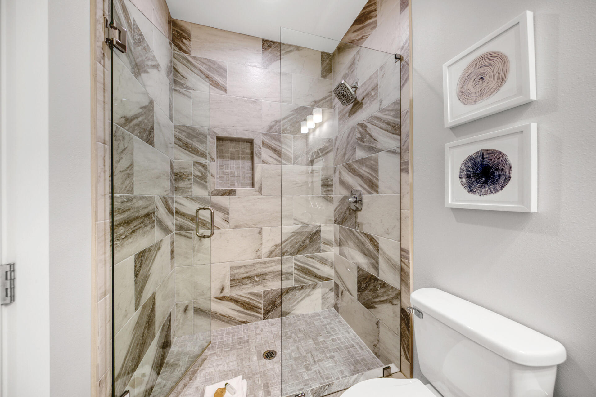 106 Shirah Street Destin, FL 32541 - Photo 24 of 67 a white toilet sitting next to a bathroom sink