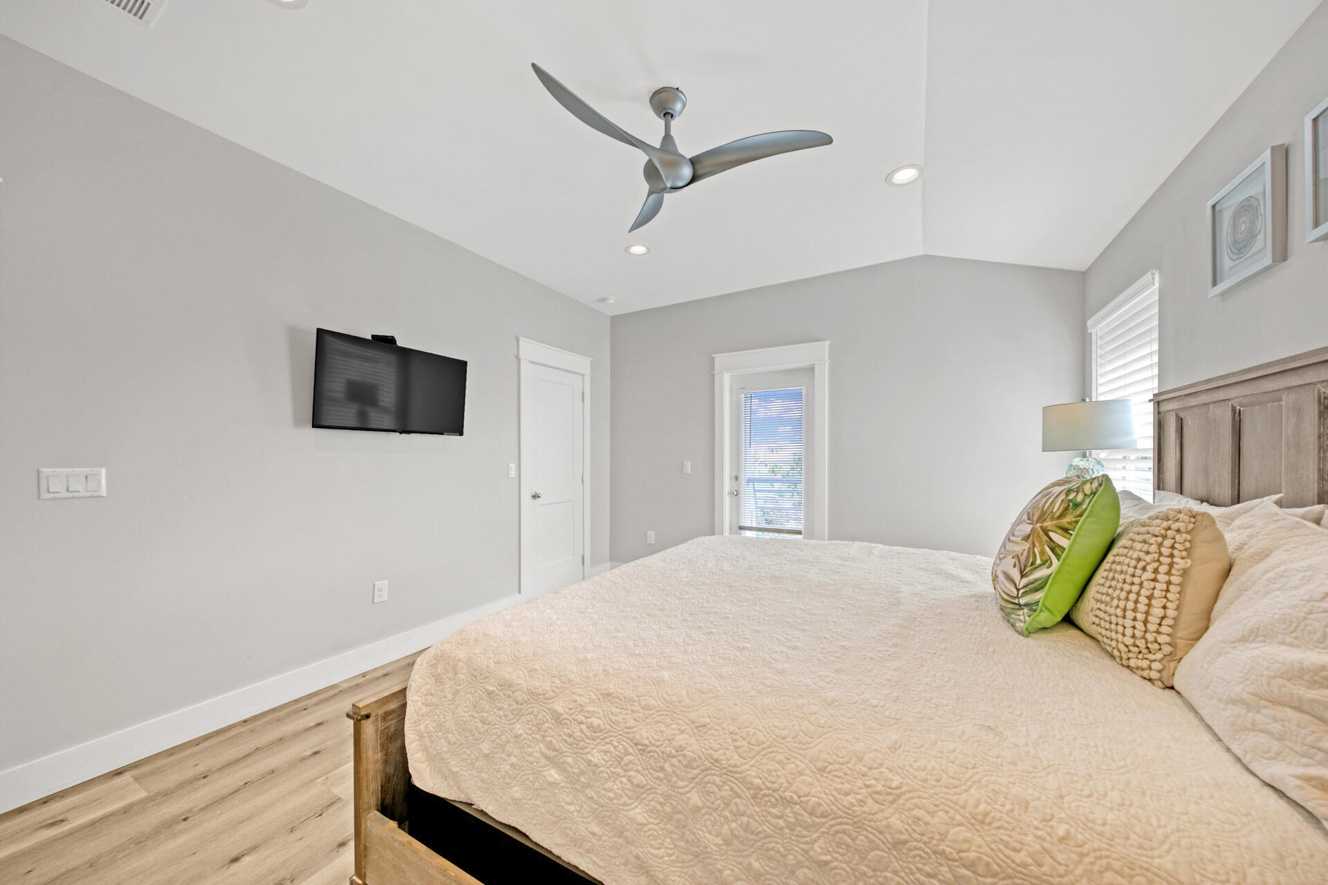 106 Shirah Street Destin, FL 32541 - Photo 28 of 67 a bedroom with a bed and a flat screen tv