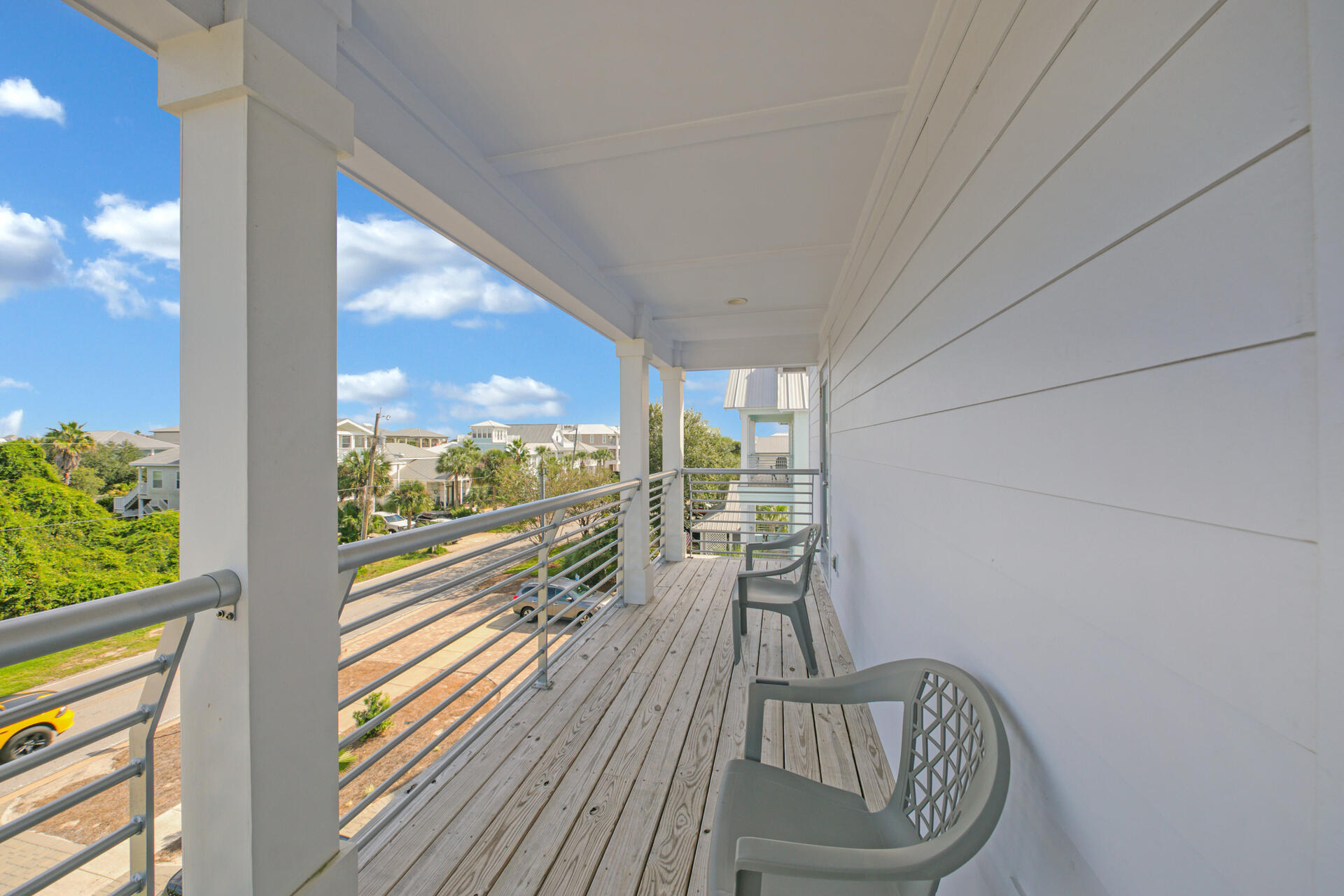 106 Shirah Street Destin, FL 32541 - Photo 31 of 67 a view of a balcony with wooden floor