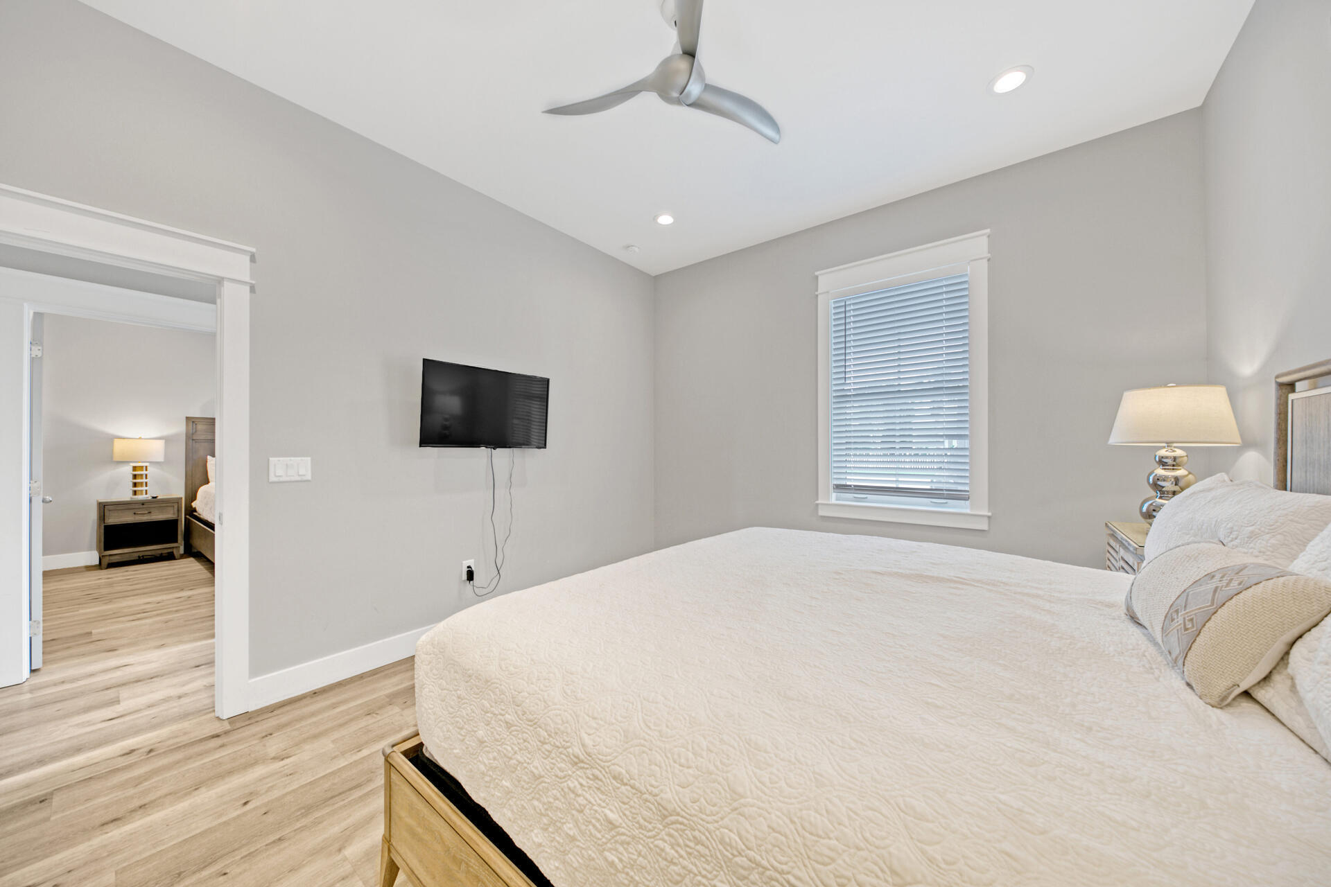 106 Shirah Street Destin, FL 32541 - Photo 43 of 67 a bedroom with a bed and a flat screen tv