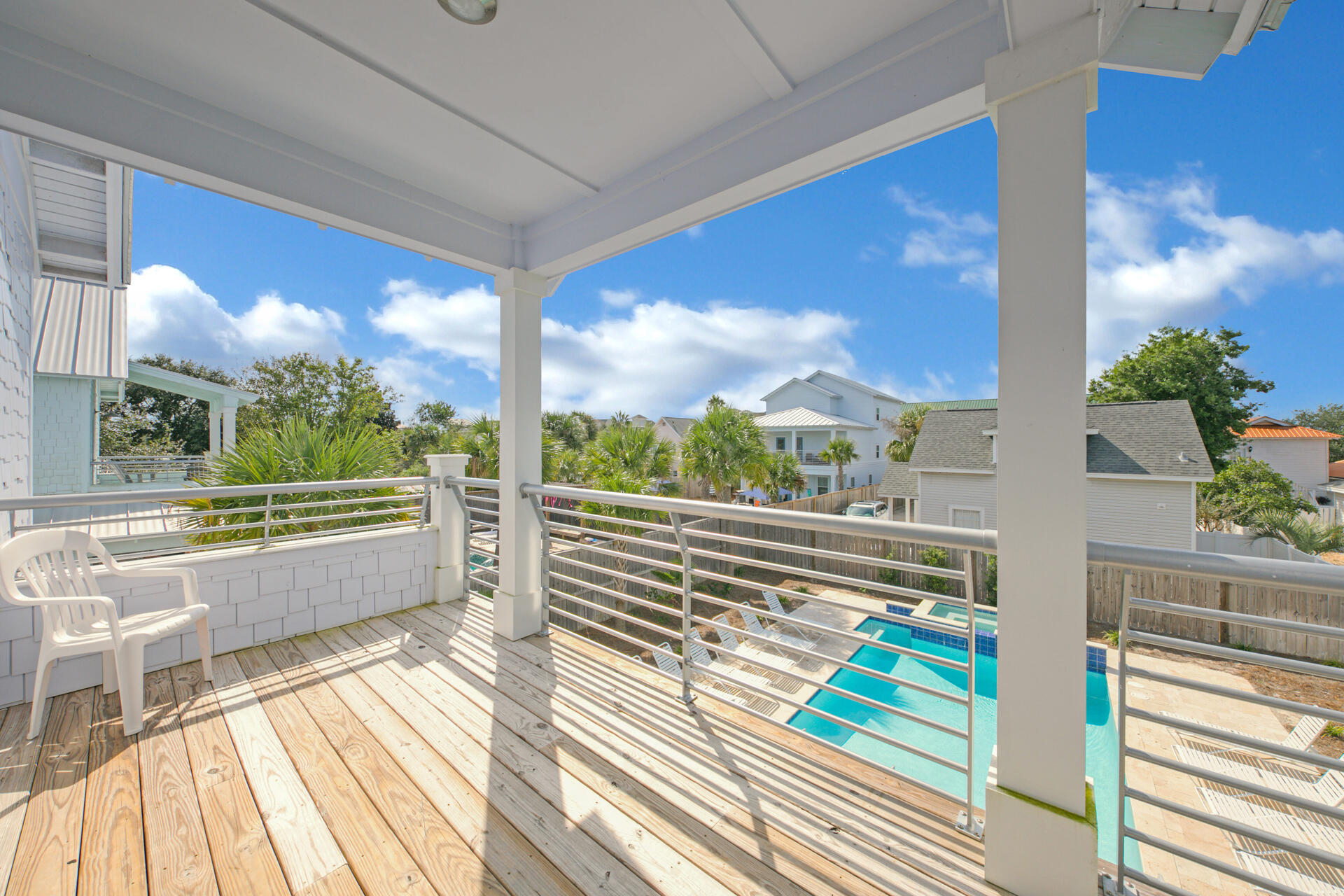 106 Shirah Street Destin, FL 32541 - Photo 51 of 67 a view of a balcony with wooden floor and outdoor space