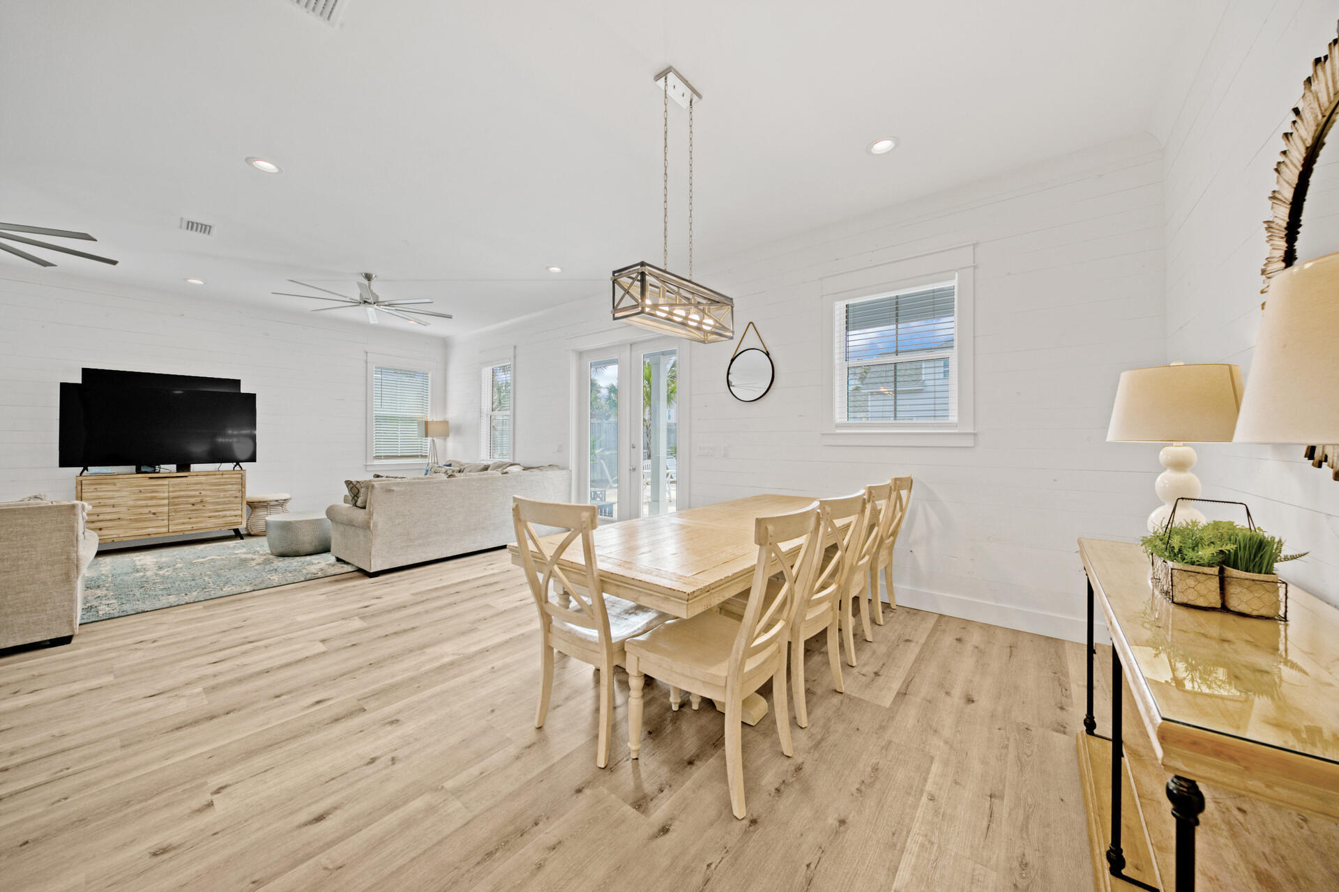 106 Shirah Street Destin, FL 32541 - Photo 6 of 67 a view of a dining room with furniture window and wooden floor
