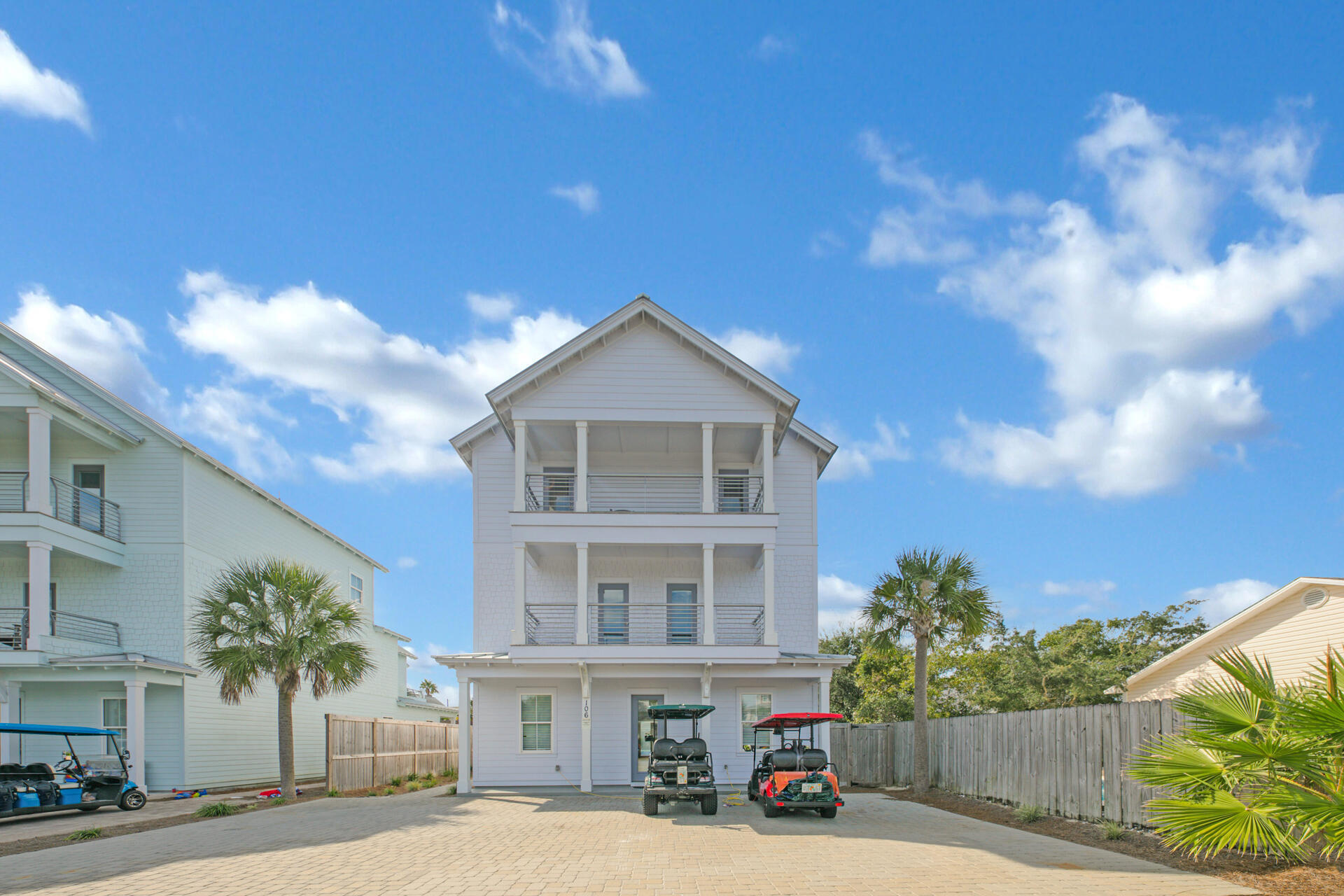 106 Shirah Street Destin, FL 32541 - Photo 61 of 67 a front view of a house with a yard