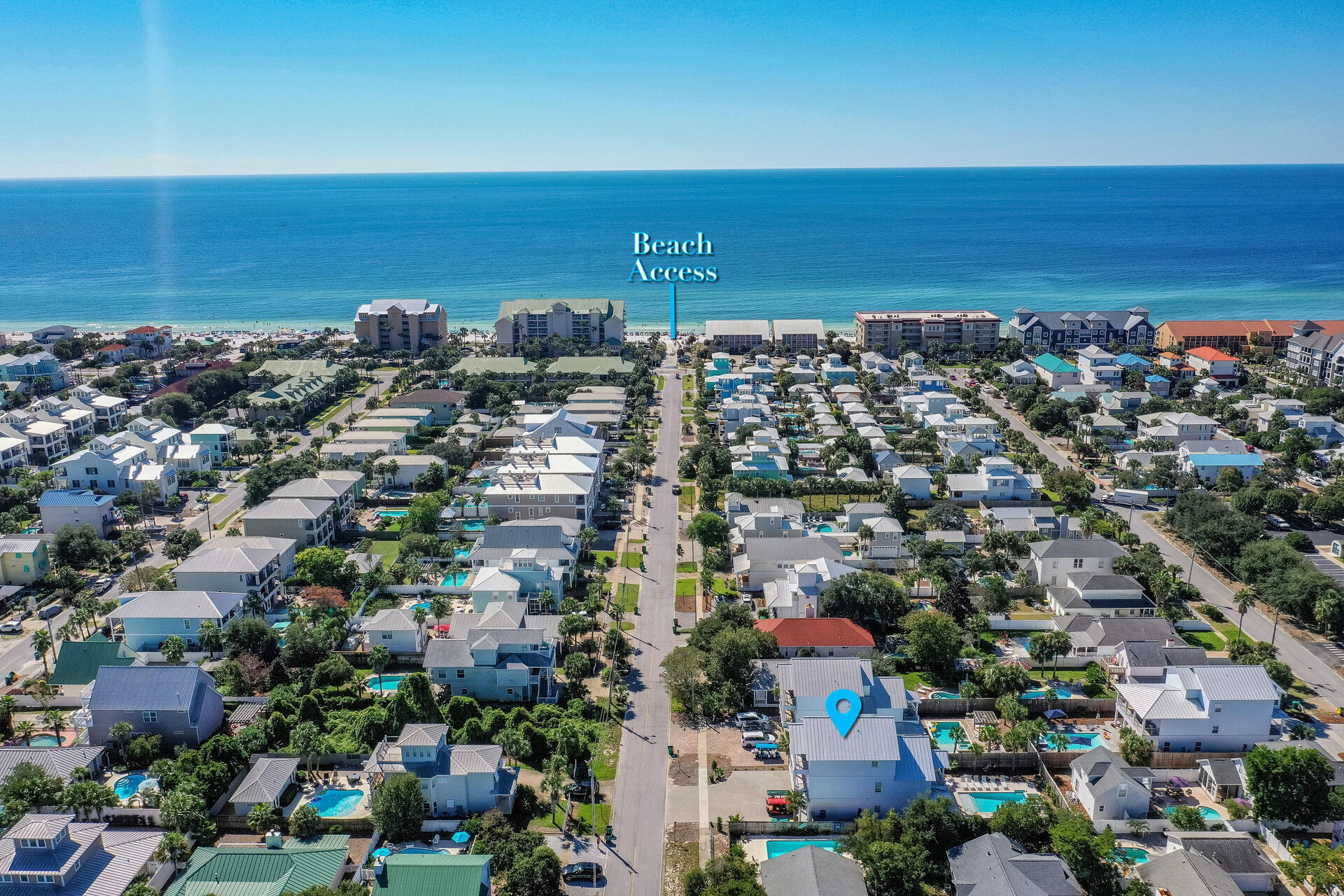 106 Shirah Street Destin, FL 32541 - Photo 66 of 67 an aerial view of a city with lots of residential buildings and ocean view in back