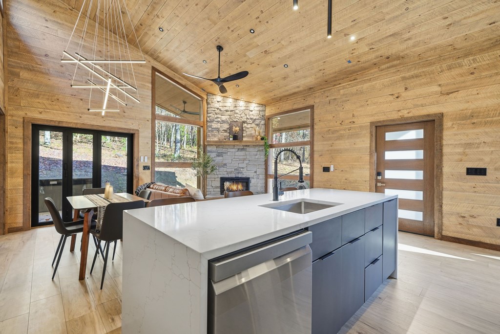 138 Cottonwood Lane Blue Ridge, GA 30513 - Photo 13 of 35 a kitchen with stainless steel appliances granite countertop a sink and a refrigerator