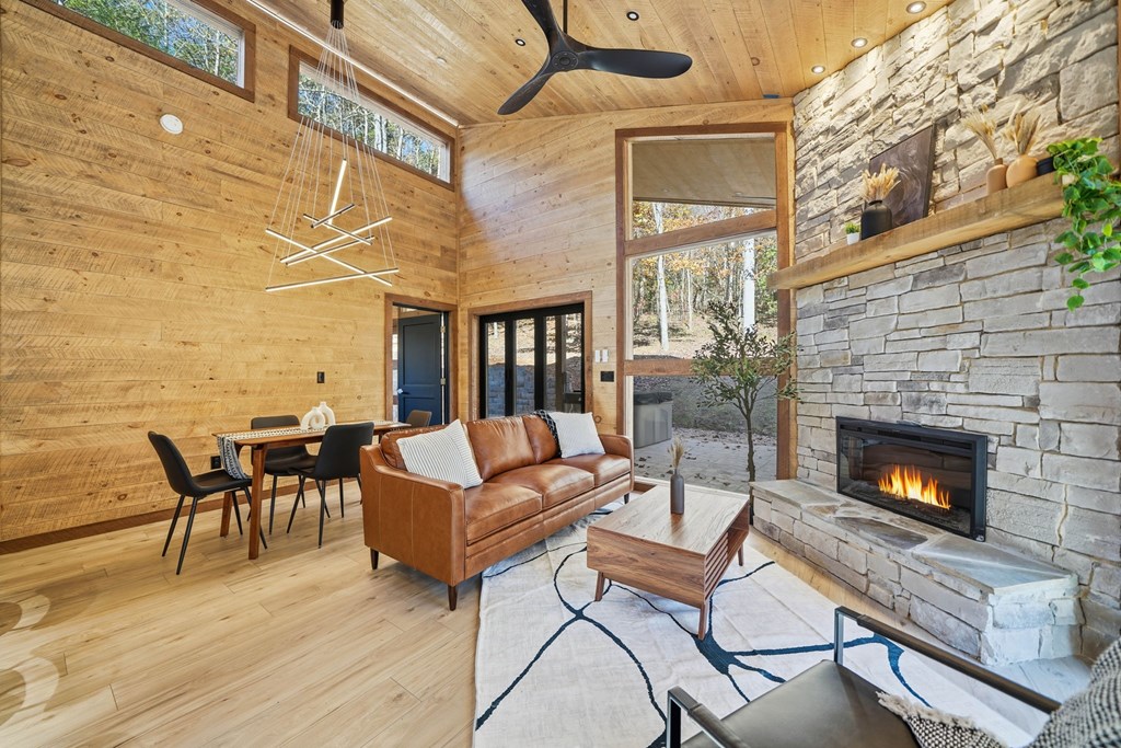 138 Cottonwood Lane Blue Ridge, GA 30513 - Photo 16 of 35 a outdoor space with patio couch and fireplace