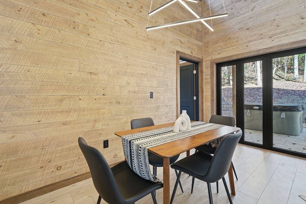 138 Cottonwood Lane Blue Ridge, GA 30513 - Photo 17 of 35 a view of a dining room with furniture and wooden floor