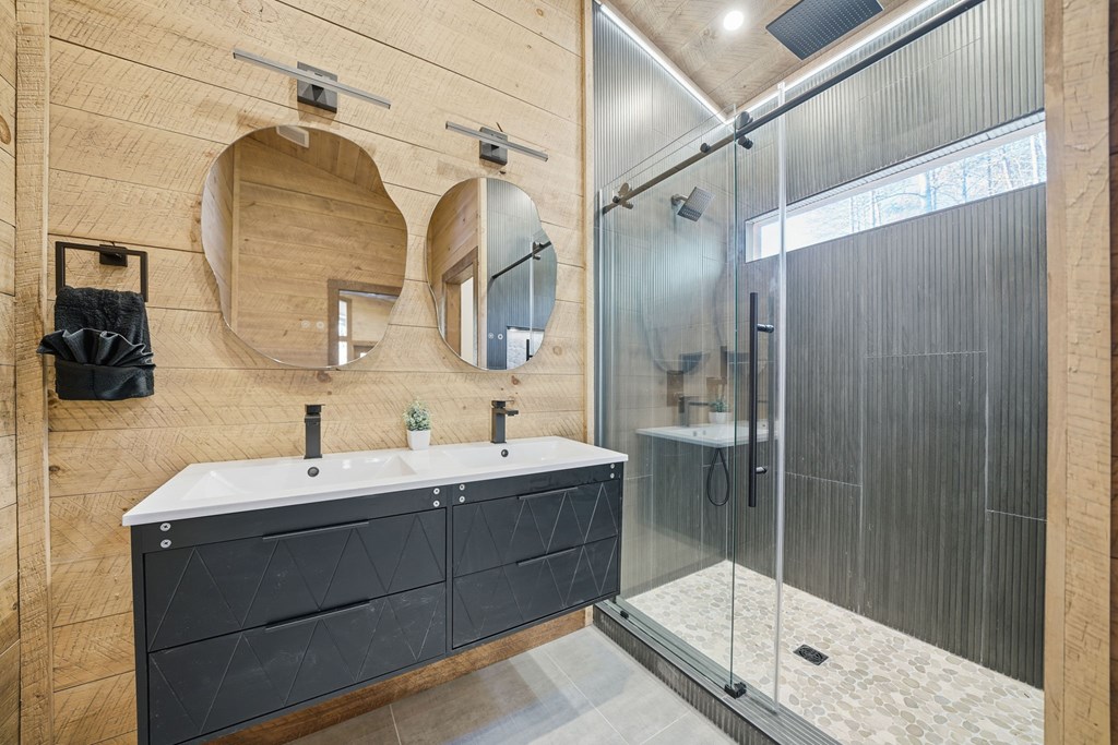 138 Cottonwood Lane Blue Ridge, GA 30513 - Photo 21 of 35 a bathroom with a double vanity sink mirror and shower