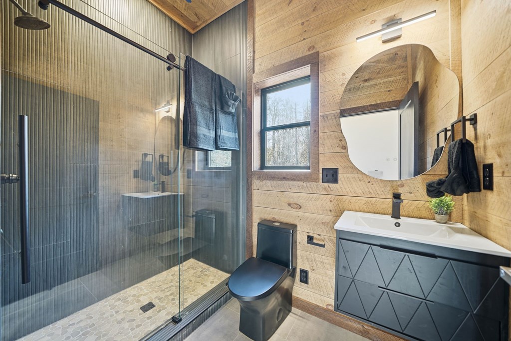 138 Cottonwood Lane Blue Ridge, GA 30513 - Photo 25 of 35 a bathroom with a sink a toilet and shower