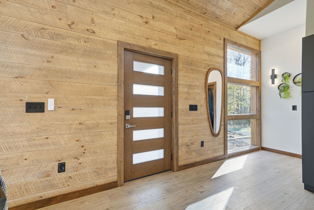 138 Cottonwood Lane Blue Ridge, GA 30513 - Photo 7 of 35 a view of a hallway with wooden floor and windows