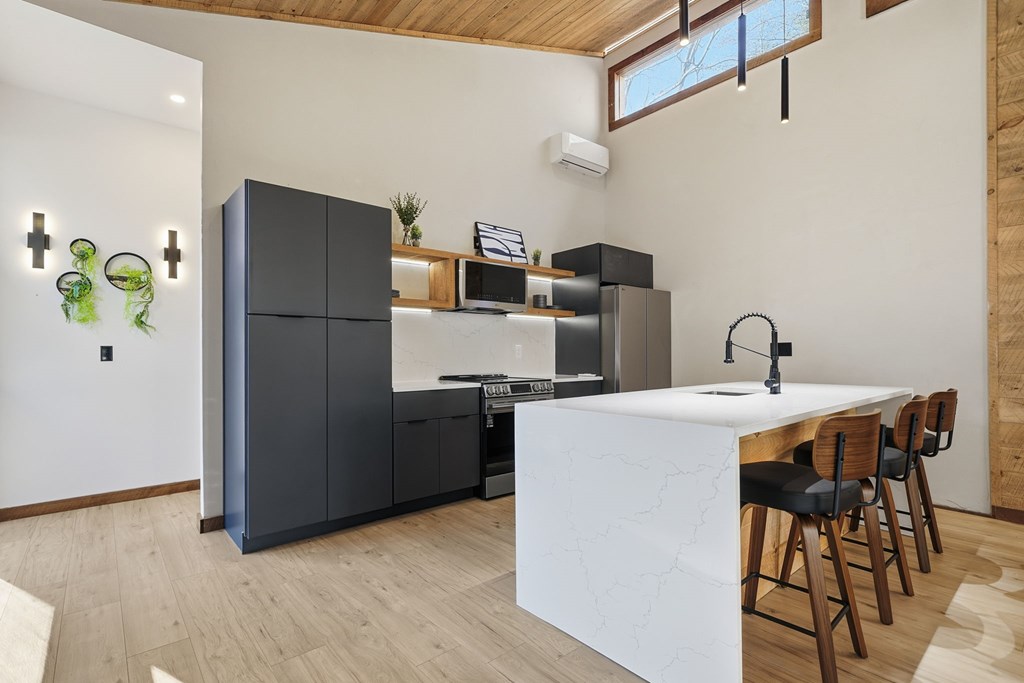 138 Cottonwood Lane Blue Ridge, GA 30513 - Photo 9 of 35 a kitchen with stainless steel appliances a refrigerator and a sink