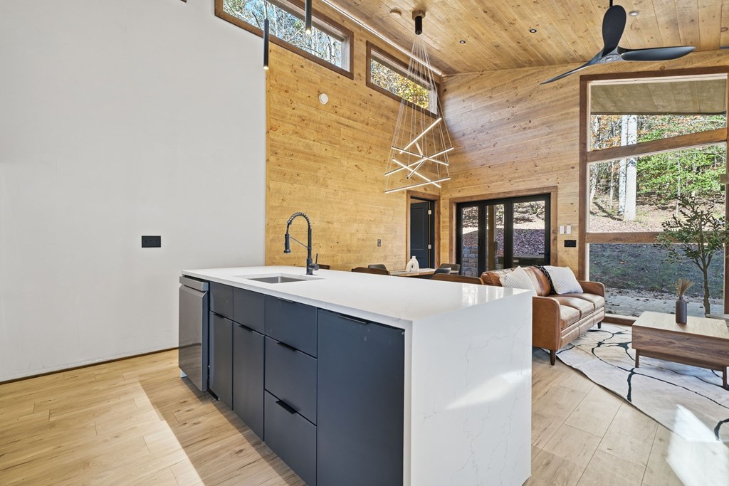 138 Cottonwood Lane Blue Ridge, GA 30513 - Photo 10 of 35 a living room with a sink and a table