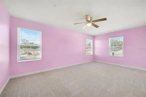 a view of a big room with carpet