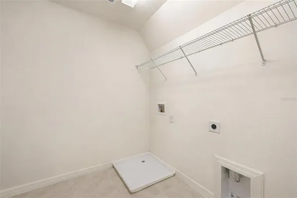 a view of a house with a back yard