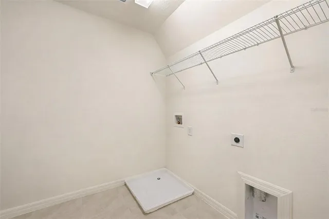 a view of a house with a back yard