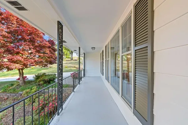 a view of a house with a porch