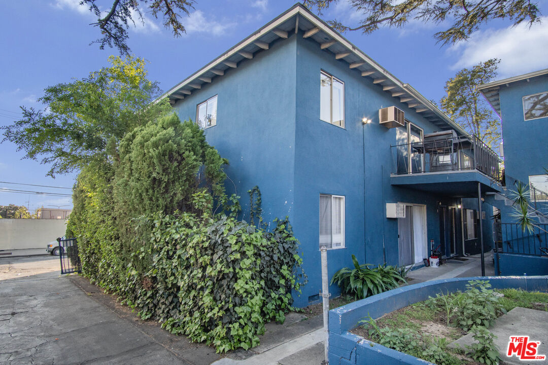 755 East Pine Street Altadena, CA 91001 - Photo 10 of 15 front view of a house with potted plants