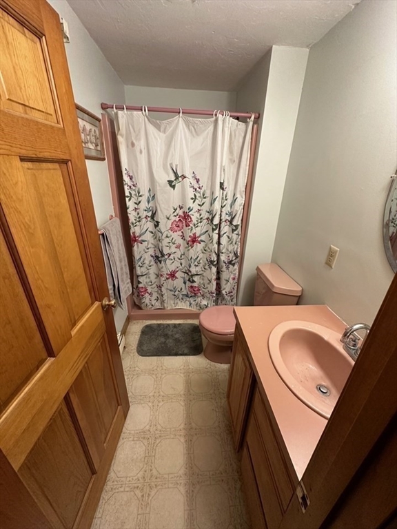 79 Lower Gore Road Webster, MA 01570 - Photo 17 of 27 a bathroom with a sink toilet and tub